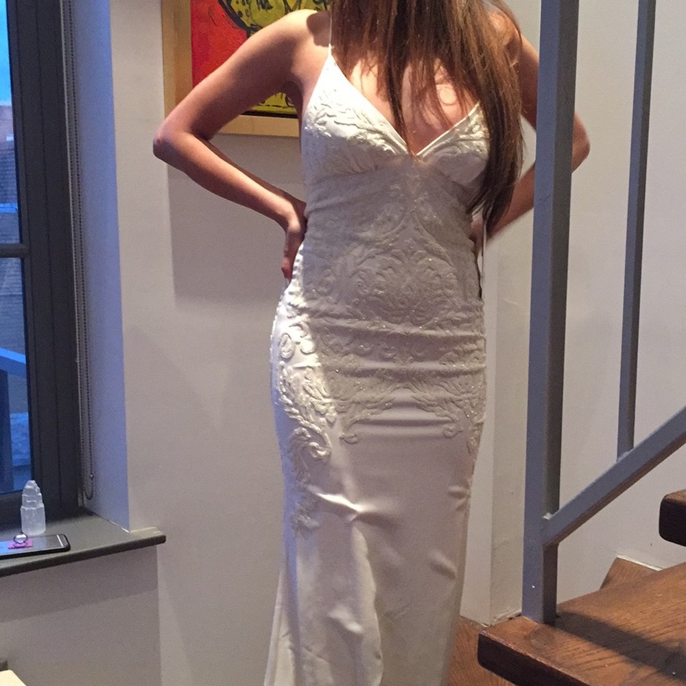 Nicole Miller wedding dress is for sale.